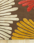 Brown transitional floral rug corner and bloom detail