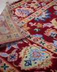 Burgundy Oushak rug back and border detail