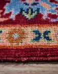 Burgundy Oushak rug border close-up