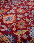 Burgundy Oushak rug field detail with floral palmettes