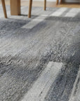 Cassandra Clara Gray and Ivory Flatweave Wool Rug in a dining room