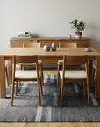 Cassandra Clara Gray and Ivory Flatweave Wool Rug in a dining room