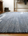 Cassandra Clara Gray and Ivory Flatweave Wool Rug in a entryway