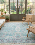 Celia Modern Green Hand Knotted Silk Rug in a sunroom