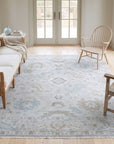 Classic Tessa Beige Hand Knotted Wool Rug in a sunroom