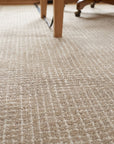 Cozy Willow Brown and Ivory Hand Tufted Wool Rug in a home office