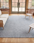 Delicate Giselle Gray Handmade Wool Rug in a sunroom