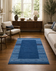 Handloomed Blue Gabbeh Tribal Wool Area Rug in a styled room (5)