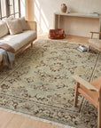 Elena Rustic Green Hand Knotted Wool Rug in a sunroom