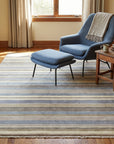 Ella Rustic Brown and Blue Handmade Wool Rug in a reading nook