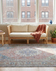 Ember Heritage Blue Handmade Wool Rug in a sunroom