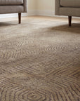 Exquisite Yara Brown Hand Knotted Wool Rug in a living room