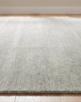 Freya Gabbeh Gray Handmade Wool Rug in a bedroom