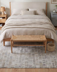 Freya Timeless Ivory Hand Knotted Wool Rug in a bedroom