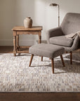 Freya Timeless Ivory Hand Knotted Wool Rug in a reading nook