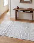 Jasmine Moroccan Ivory Hand Knotted Wool Rug in a hallway
