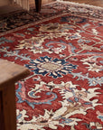 Lila Chic Red Hand Knotted Wool Rug in a living room
