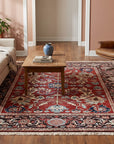 Lila Chic Red Hand Knotted Wool Rug in a living room