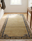 Lila Timeless Beige Hand Knotted Wool Rug in a hallway