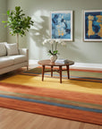 Multicolor striped Gabbeh handmade wool area rug styled in a living room