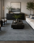 Blue contemporary transitional hand-loomed wool area rug styled in a modern living room