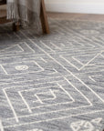 Luxurious Kilim Charcoal Handmade Wool Rug in a bedroom