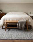 Luxurious Kilim Charcoal Handmade Wool Rug in a bedroom