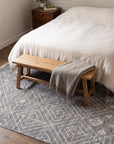 Luxurious Kilim Charcoal Handmade Wool Rug in a bedroom
