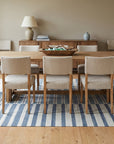 Majestic Laine Multicolor Flatweave Wool Rug in a dining room