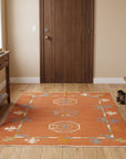 Maya Kilim Rust Flatweave Wool Rug in a entryway