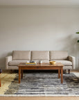 Mira Iris Yellow Hand Knotted Wool Rug in a living room