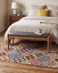 Nadia Kilim Multicolor Flatweave Wool Rug in a bedroom
