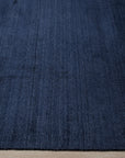 Navy blue solid handmade wool and viscose rug