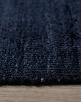 Navy blue solid handmade wool and viscose rug
