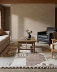 Nina Oriental Multicolor Hand Knotted Wool Rug in a living room