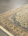 Ivory Naiin traditional oriental hand-knotted wool and silk area rug