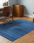 Para Penelope Blue Flatweave Wool Rug in a home office