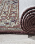 Lydia Vibrant Red Hand Tufted Wool Rug, a fiery splash of hand-tufted wool, anchors a modern living space, its bold red tones radiating warmth and inviting touch.