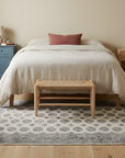 Rustic Nina Beige Hand Knotted Wool Rug in a bedroom