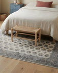 Rustic Nina Beige Hand Knotted Wool Rug in a bedroom