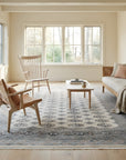 Rustic Nina Beige Hand Knotted Wool Rug in a sunroom
