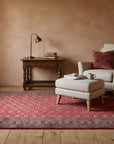Rustic Nina Red Hand Knotted Wool Rug in a reading nook