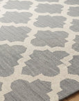 Selene Elena Gray Flatweave Wool Rug in a dining room