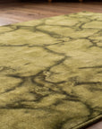 Sleek Cozy Green Hand Knotted Wool Rug in a bedroom