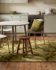 Sleek Cozy Green Hand Knotted Wool Rug in a kitchen