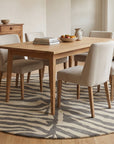 Sleek Graceful Multicolor Hand Tufted Wool Rug in a dining room