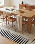 Sloane Majestic Gray and Ivory Flatweave Wool Rug in a dining room