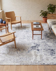 Sumptuous Lila Beige and Gray Machine Made Wool Rug in a sunroom