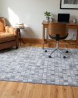 Tessa Sophisticated Gray Hand Knotted Wool Rug in a home office