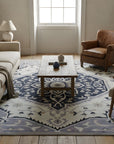 Timeless Oriental Ivory and Gray Hand Knotted Wool Rug in a living room